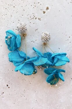 Emilita Teal Petal Earrings 7 Emilita Teal Petal Earrings -ALAMOUR DRESS SALE 1 1b8aad8b f9b8 4a7b 88d0 ea6550716245